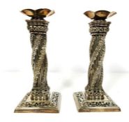 A pair of Continental silver plated twist column candlesticks, late 19th century, each with an