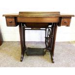 A vintage Singer sewing machine table