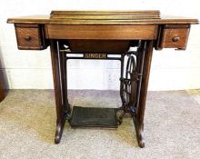 A vintage Singer sewing machine table