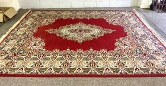 An Isfahan style modern rug, circa 2000, with central medallion on a vermillion ground within