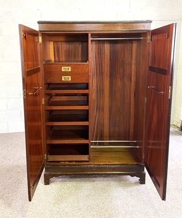 A mahogany veneered double wardrobe, 20th century, with two panelled doors, 181cm high - Image 2 of 2