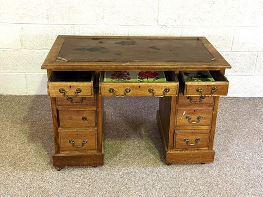 A small Victorian kneehole desk, with an arrangement of nine drawers, 74cm high, 106cm wide; and a - Image 3 of 7