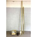 Two large brass effect curtain poles, 290cm long, including hangers; also includes lamps & shades