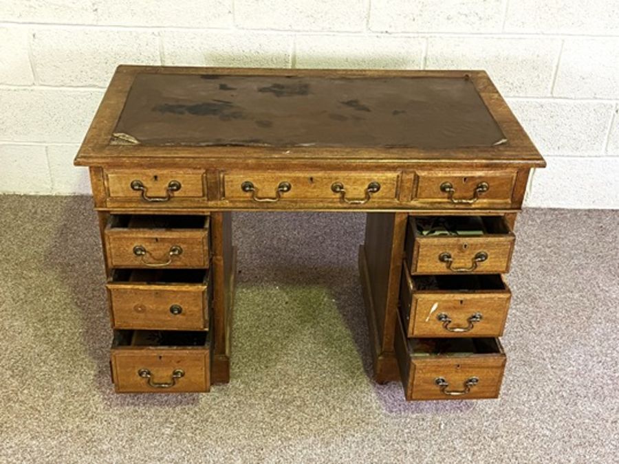 A small Victorian kneehole desk, with an arrangement of nine drawers, 74cm high, 106cm wide; and a - Image 2 of 7