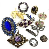 A quantity of costume jewellery, including a Victorian yellow metal and amethyst brooch, 10.6g (