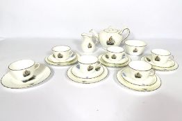 A Doulton commemorative Diamonds Jubilee Queen Victoria tea service, each piece decorated with a