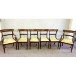 A set of six late Regency mahogany bar backed dining chairs, including two armchairs; together