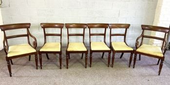 A set of six late Regency mahogany bar backed dining chairs, including two armchairs; together