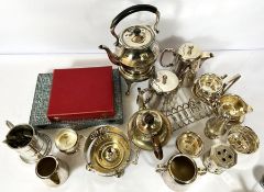 An assortment of silver plate and flatware, including a plated baluster castor, a sectional