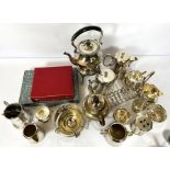 An assortment of silver plate and flatware, including a plated baluster castor, a sectional