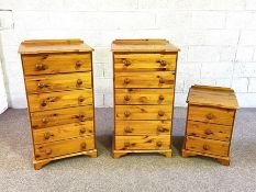 A pair of modern pine chest of drawers, each with six drawers, 111cm high; together with a smaller
