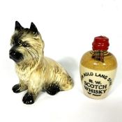 A Sylvac model of a Cairn Terrier, number 3447, 13cm high; together with a miniature stoneware