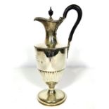 A Victorian silver ewer or claret jug, hallmarked London, 1887, of traditional Adam style urn shaped