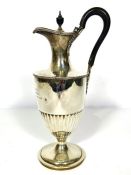 A Victorian silver ewer or claret jug, hallmarked London, 1887, of traditional Adam style urn shaped