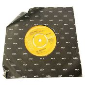 Assorted vintage records, including David Bowie “The Jean Genie” RCA single; Lonnie Donegan; and