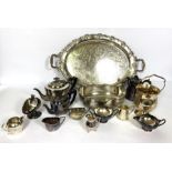 A large assortment of silver plate, including a tea tray, various teapots, trays and other