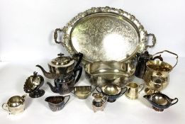 A large assortment of silver plate, including a tea tray, various teapots, trays and other