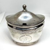 A Regency silver mustard pot, hallmarked Thomas Robins, London 1802, of oval waisted form with a