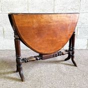 A Victorian Sutherland table, with oval drop leaf top and turned legs