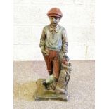 A novelty painted and cast figure of a golfer, 68cm high