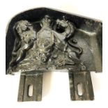 A pair of cast iron door stops, each with a Royal armorial, with mounting brackets (heavy), 26cm