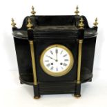 A Victorian Architectural ebonized mantel clock, late 19th century, with a barrel movement, striking