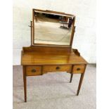 A 19th century style dressing table, with Gillows label to drawer, early 20th century, with a