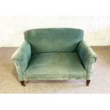 A small vintage green upholstered sofa, with curved back and scrolled arms, 130cm wide