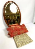 An oval walnut framed mirror, 72cm high; together with a vintage Paisley pattern rug, 160cm square