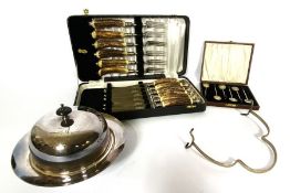 A small quantity of cased flatware and a plated muffin dish, including a set of antler handled