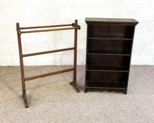A small vintage oak open bookcase, 107cm high, 64cm wide, together with a towel rail and a pink