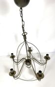 Two modern hanging light fittings, one with five lamps, suspended from a chain, 59cm diameter; the