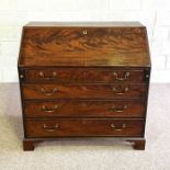 A George III mahogany bureau, circa 1760, well proportioned, with a fall front opening to reveal