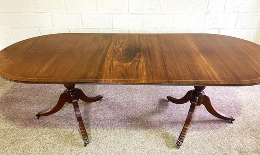 A George III style twin pillar mahogany dining table, modern, with one leaf; together with a set - Image 2 of 3