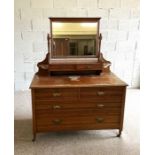 An Edwardian dressing chest, with rectangular mirrored top, 156cm high, 122cm wide; together with an