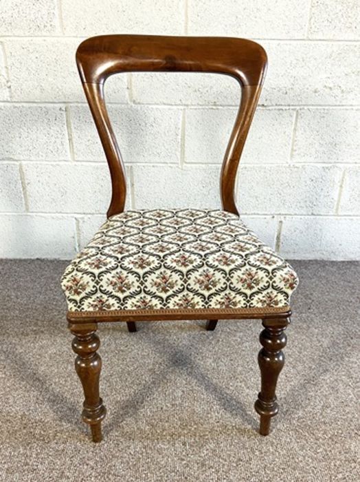 A set of six Victorian mahogany balloon backed dining chairs, and an associated armchair, mid 19th - Image 7 of 15