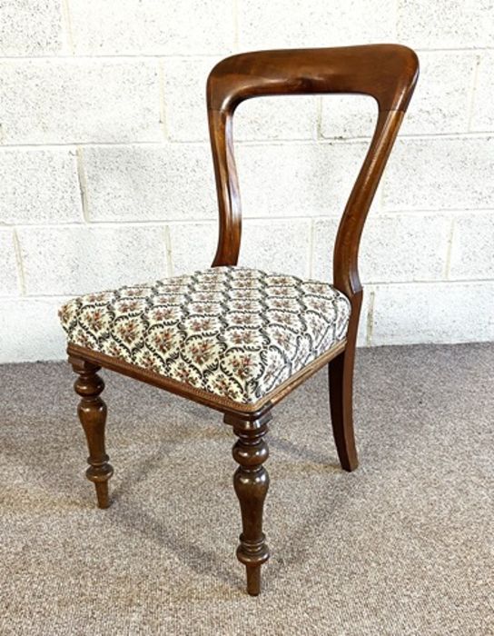 A set of six Victorian mahogany balloon backed dining chairs, and an associated armchair, mid 19th - Image 8 of 15