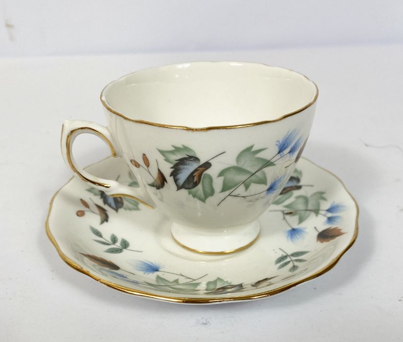A large assortment of bone china, including a part dinner service, decorated with bands of - Image 15 of 20
