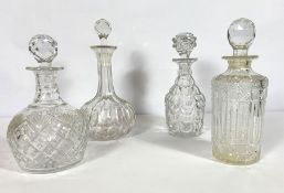 Four assorted decanters, including a mallet form decanter (4)