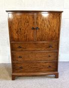 A vintage bow-front bedroom cabinet, mid 20th century, with two doors and three drawers