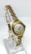 A 9 carat gold cased ladies Rotary dress watch, circa 1960, with chain strap, 13g (gross); with a