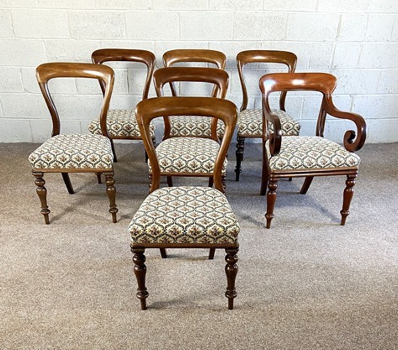 A set of six Victorian mahogany balloon backed dining chairs, and an associated armchair, mid 19th - Image 4 of 15