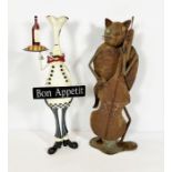 Two decorative ornaments, including a painted metal café figure of a chef; also a Jazz cat playing a