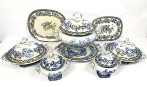 A large 19th century Ironstone dinner service, including assorted covered tureens, various plates