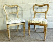 A pair of William IV rosewood hoop backed dining chairs
