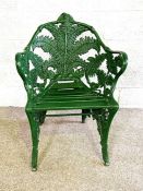 A 19th century cast iron garden seat, with fern decoration, later painted in dark green, unstamped