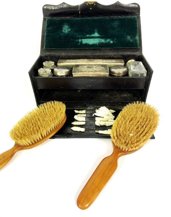 A small Victorian leather travelling necessaire vanity case, including assorted silver plate and - Image 4 of 6