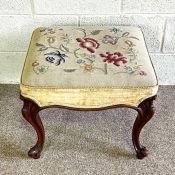 A good Victorian mahogany stool, circa 1860, with floral tapestry stuffed over seat, set on four