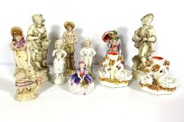 A group of assorted bone china and pottery figures, including Royal Doulton, and a spill vase with