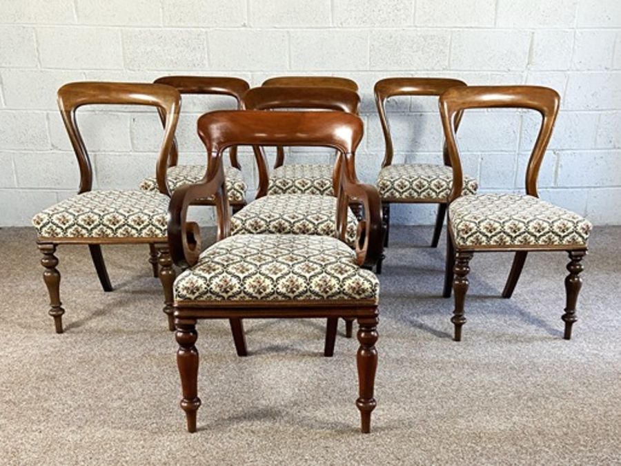 A set of six Victorian mahogany balloon backed dining chairs, and an associated armchair, mid 19th - Image 2 of 15